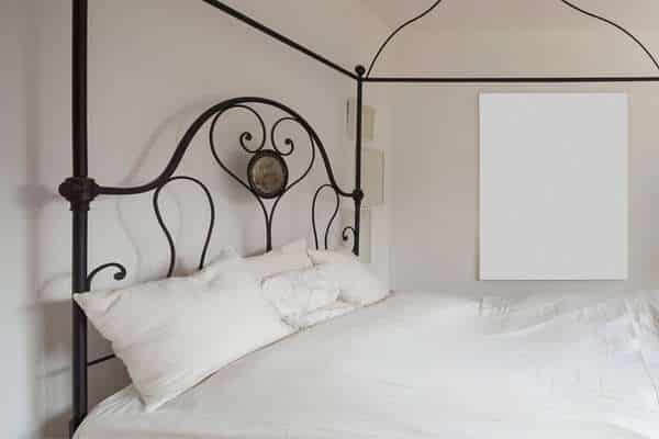 Add a Canopy for a Dramatic Effect in Black Iron Bed Decorating