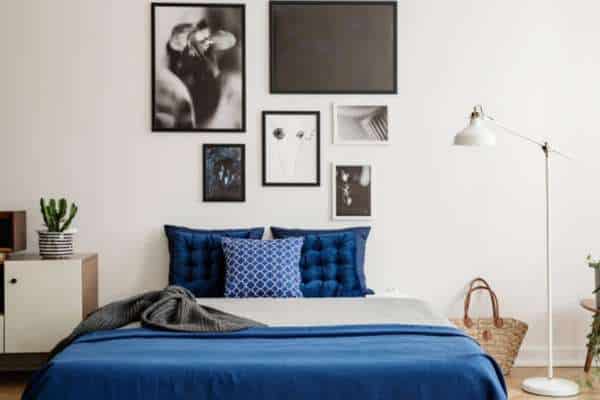  A Variety of Artworks Adorn the Walls Opposite the Bed