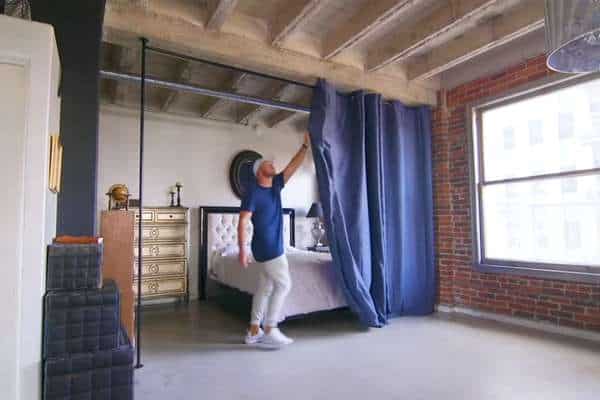 Install a Temporary Room Divider Such As a Folding Screen or Curtain