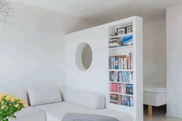 Use a Bookshelf as Partition Wall in  Divide a Bedroom Into two Rooms