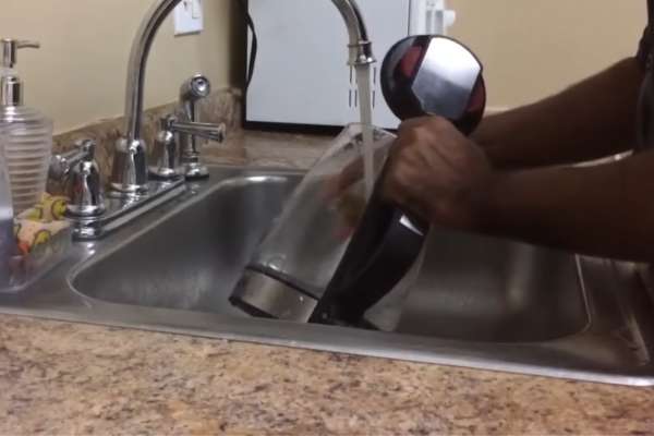 Discard The Used Baking Soda Solution And Rinse The Sink Thoroughly