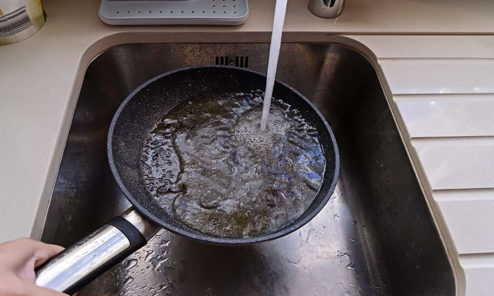 Place Non-Stick Pans Under Cold Running Water