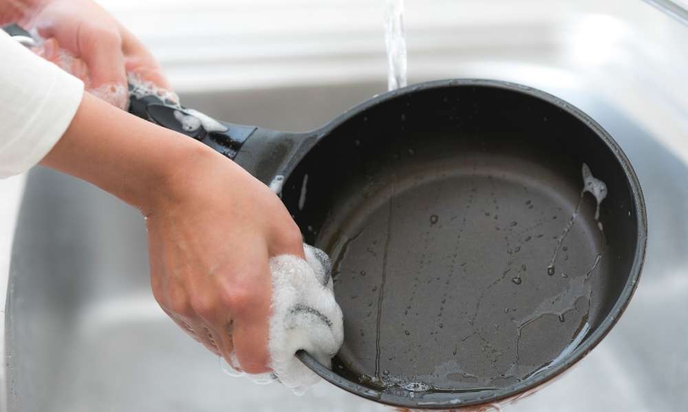 Scrap Metal Edges To Remove Melted fabric From Cookware
