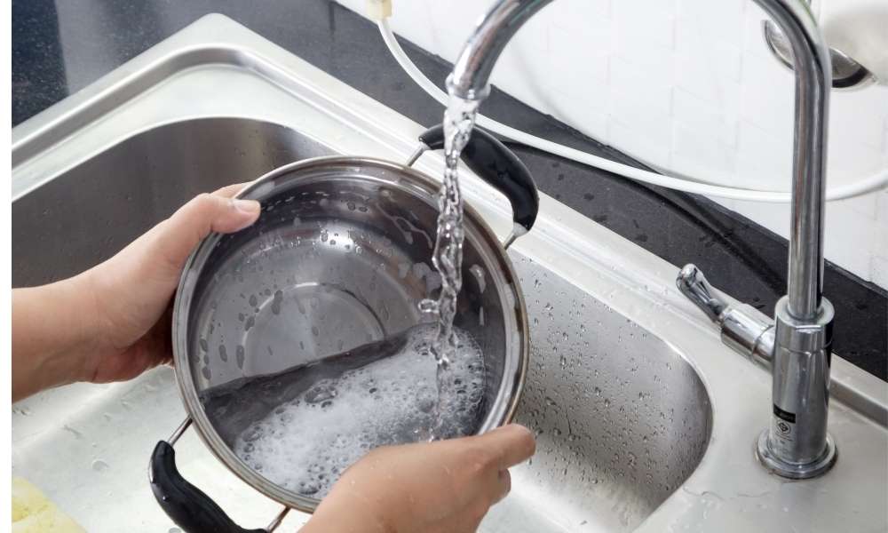 pan Wash To Remove Melted fabric From Cookware