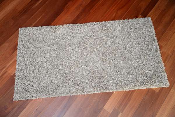 How Many Times Per Month Should The Rug be cleaned and how?
