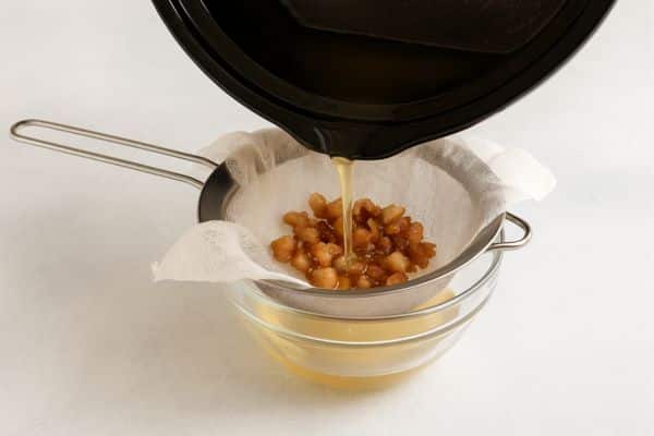 Strain with Cheesecloth To Render Beef Fat In A Slow Cooker