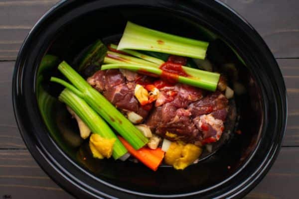 Clean and Season the Oxtails to Cook Jamaican Oxtails in a Slow Cooker