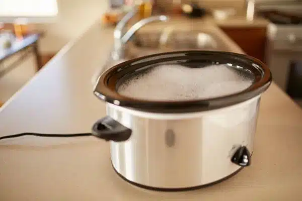 Step 1: Wash the parts and plug it in  to Use a Slow Cooker for the First Time